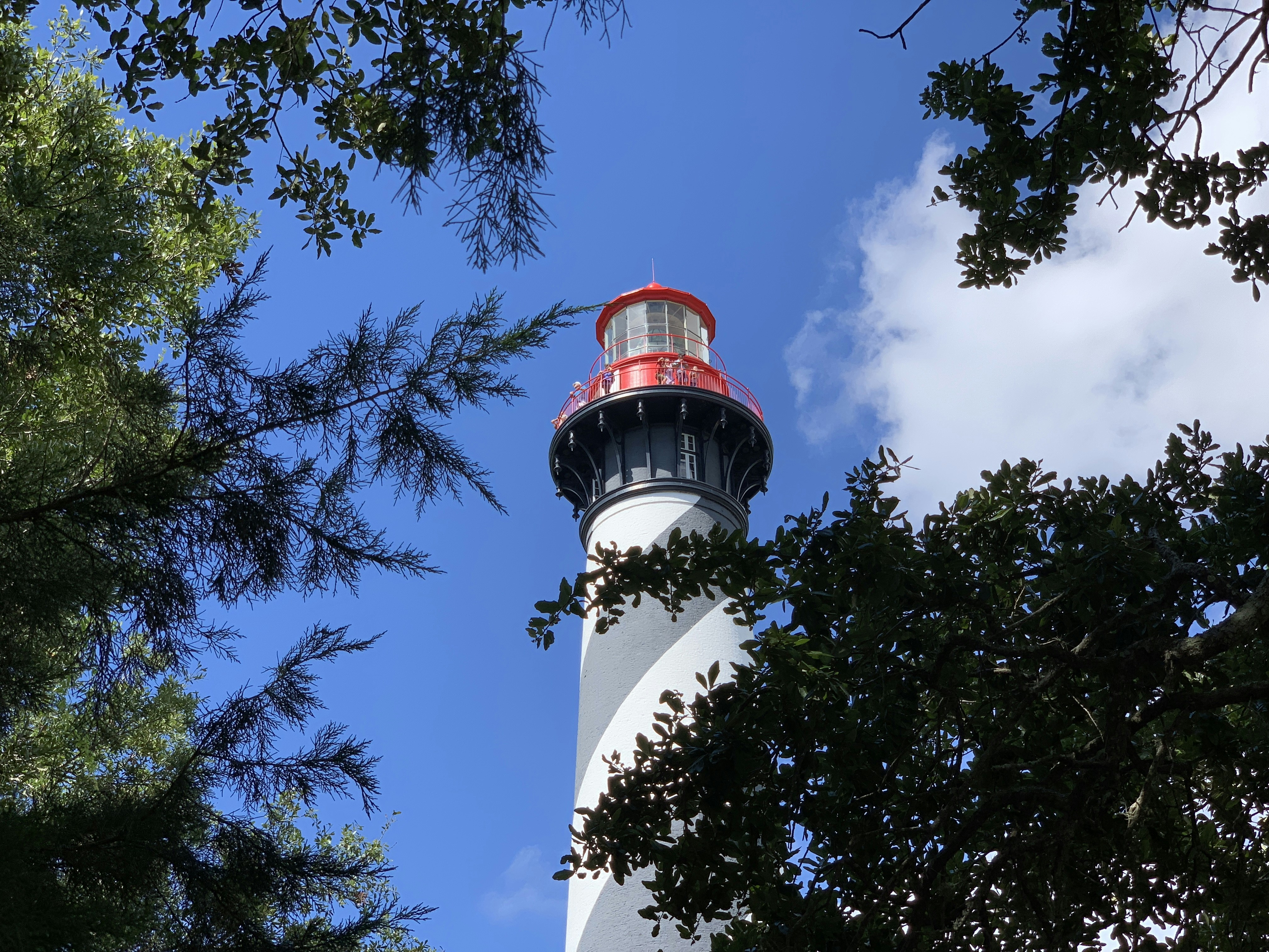 white and red tower under blue sky during daytime