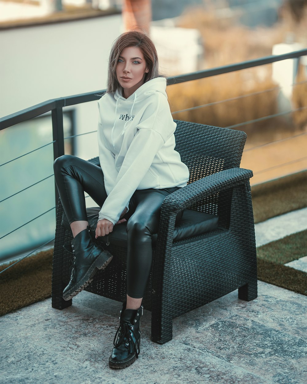 woman sitting on armchair