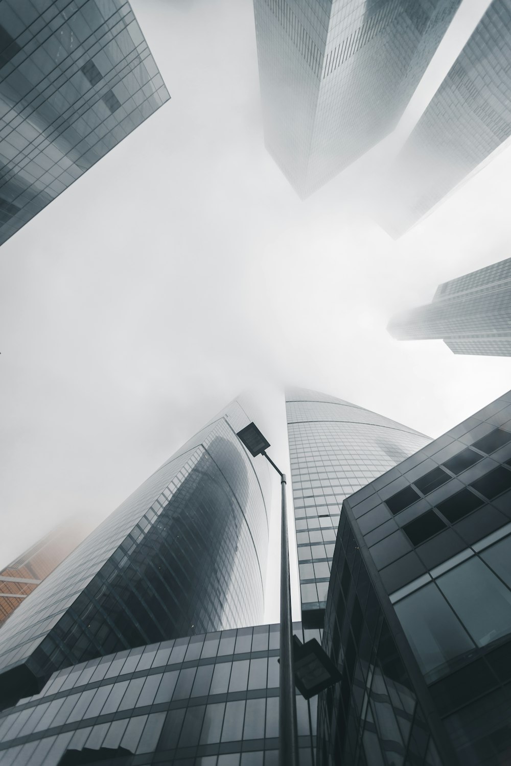 low-angle photography of high-rise buildings