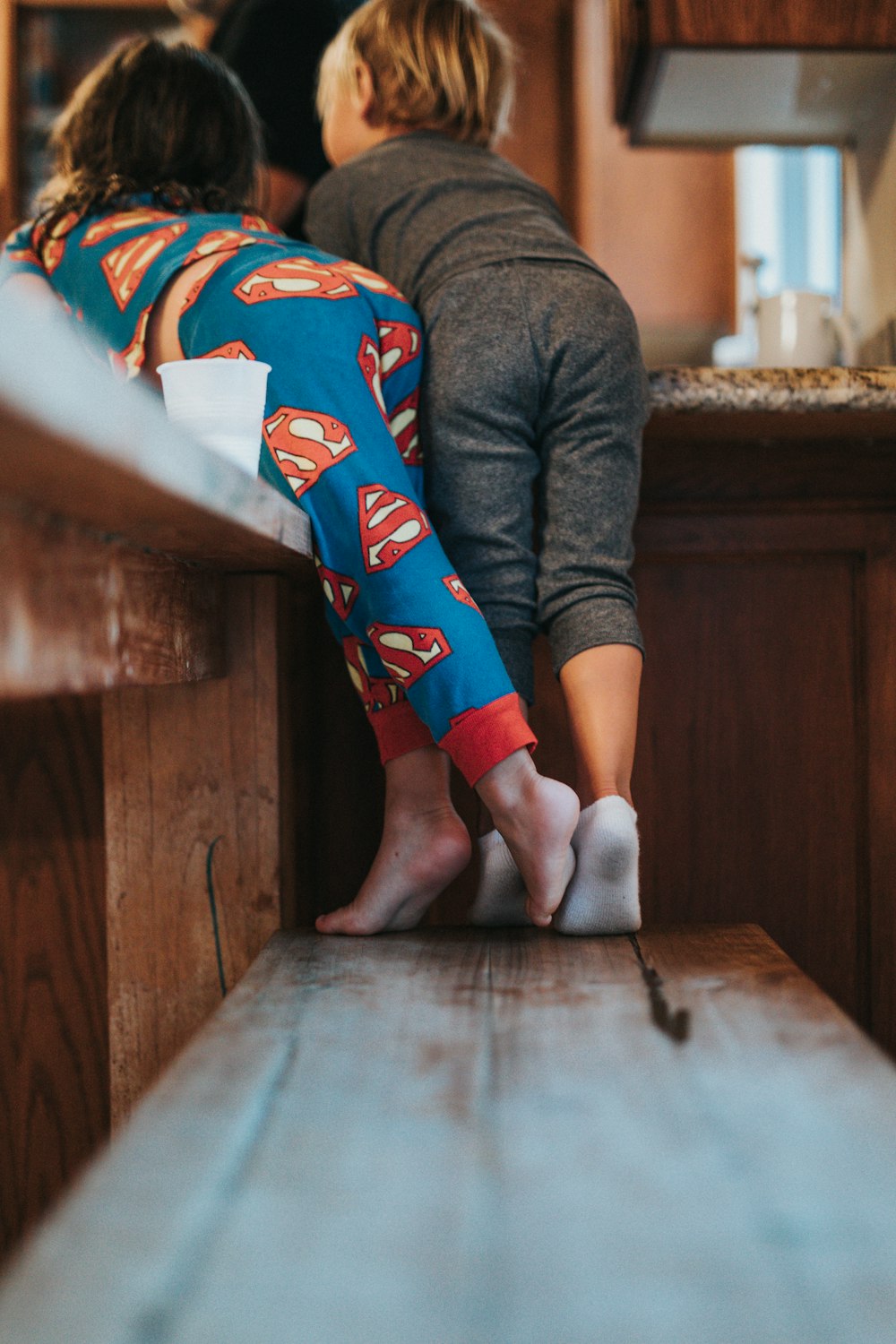 a couple of people that are standing on a counter