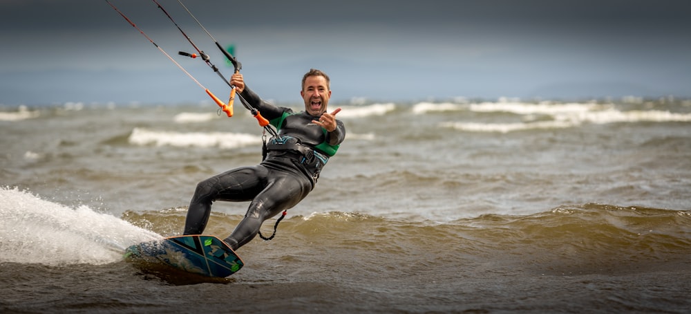 man riding surf board