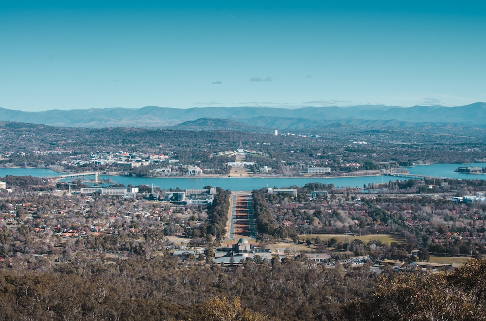 cityscape during daytime - buying an apartment in Canberra