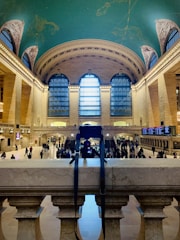 Wide shot of the main hall in the VR gallery with glowing blue cosmic elements.