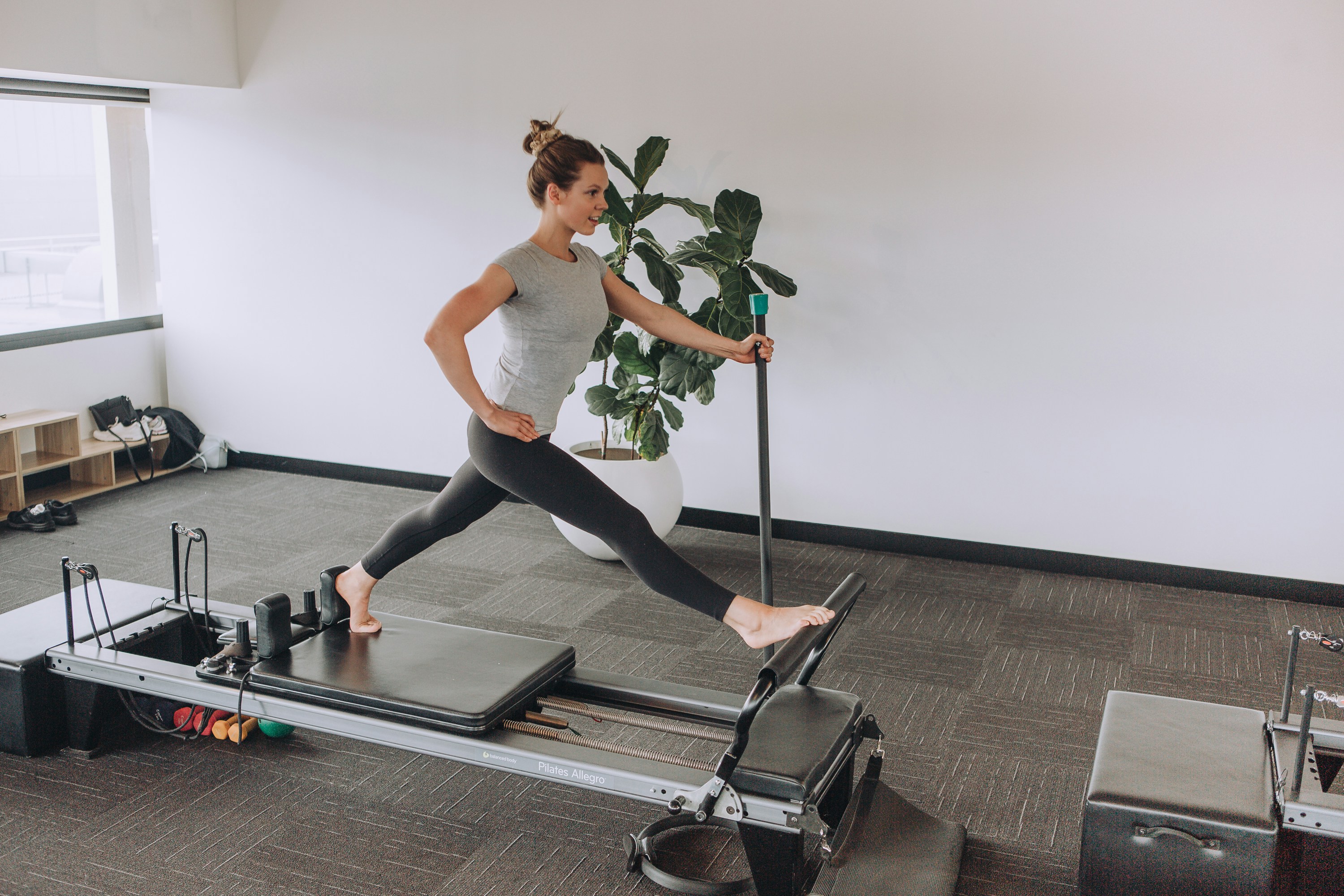 woman exercising using equipment