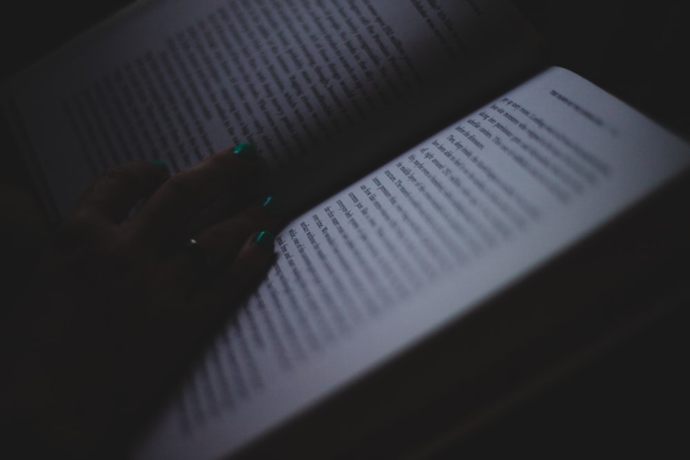 person holding book