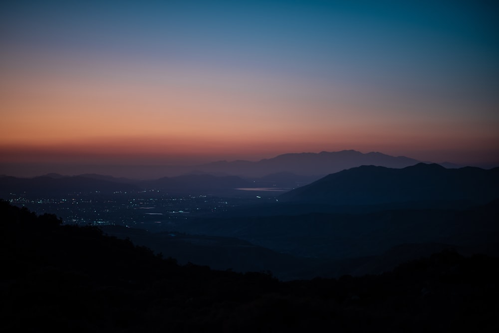 silhouette of mountain range during daytime