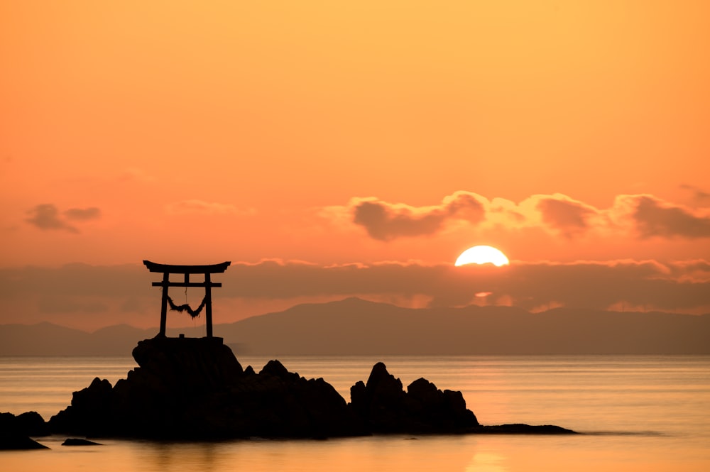 silhouette photography of island