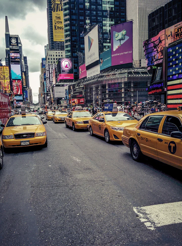 Yellow taxis on a busy city street