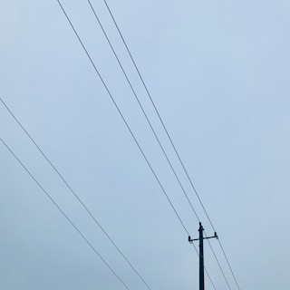 black utility post during daytime