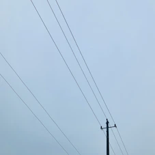 black utility post during daytime