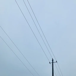 black utility post during daytime