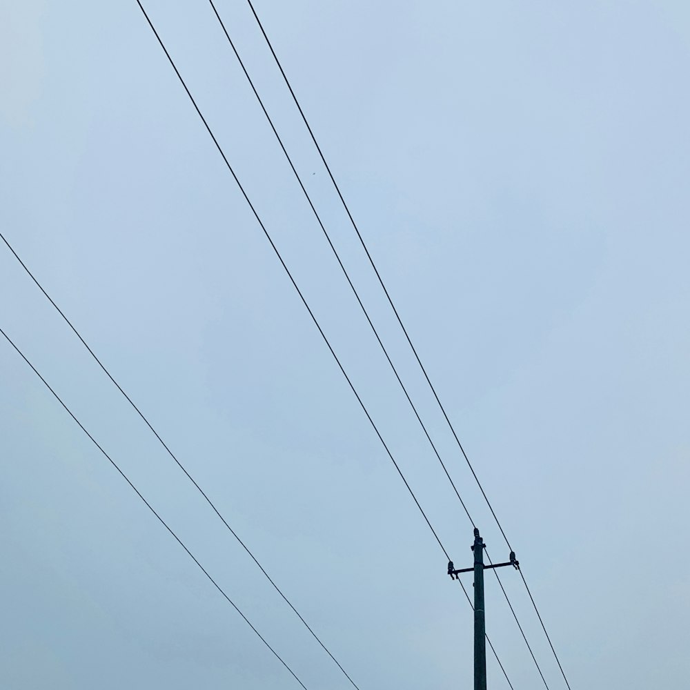 black utility post during daytime