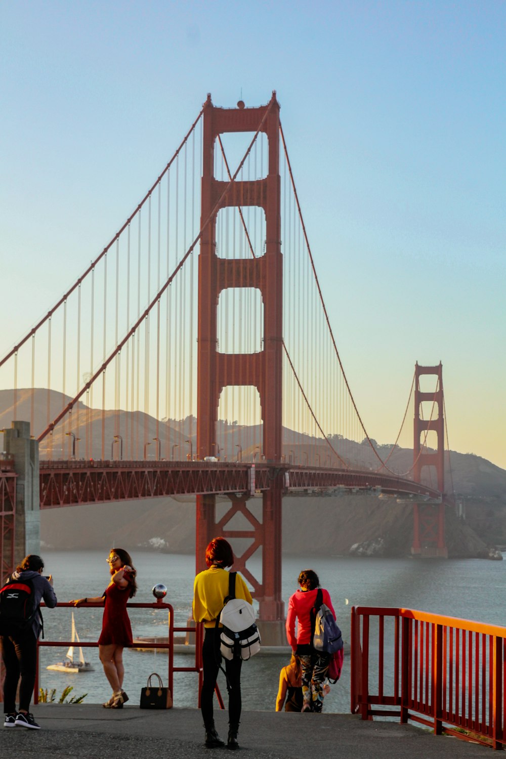 people near Golden Gate bridge during daytime