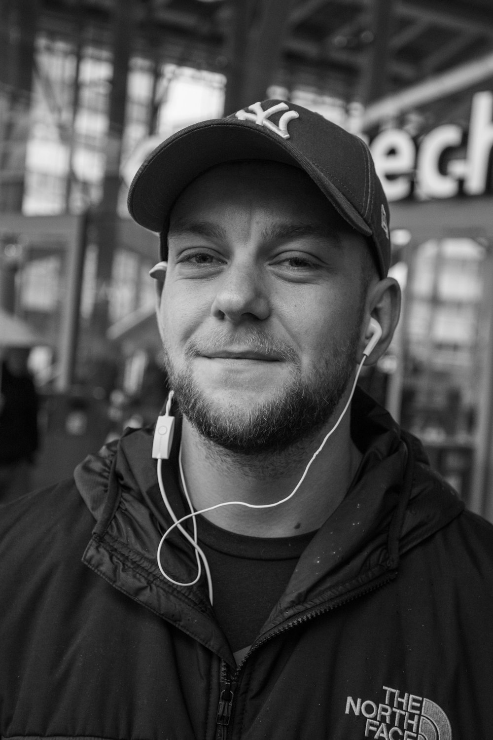 grayscale photo of woman wearing earphones