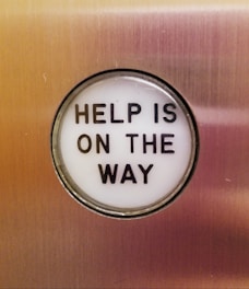 round white and black help is on the way wall art