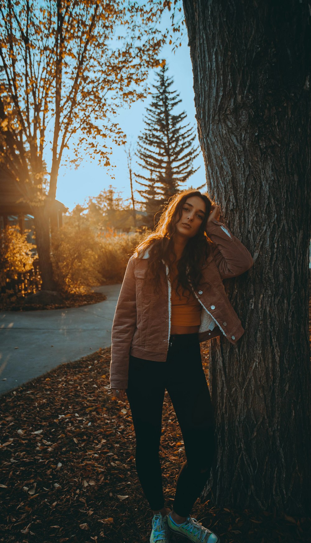 shallow focus photo of woman in brown jacket