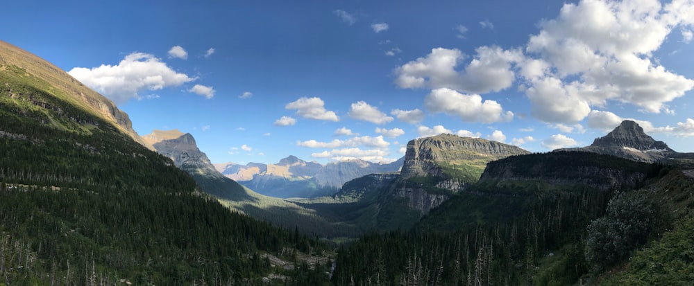 green mountains and white clouds