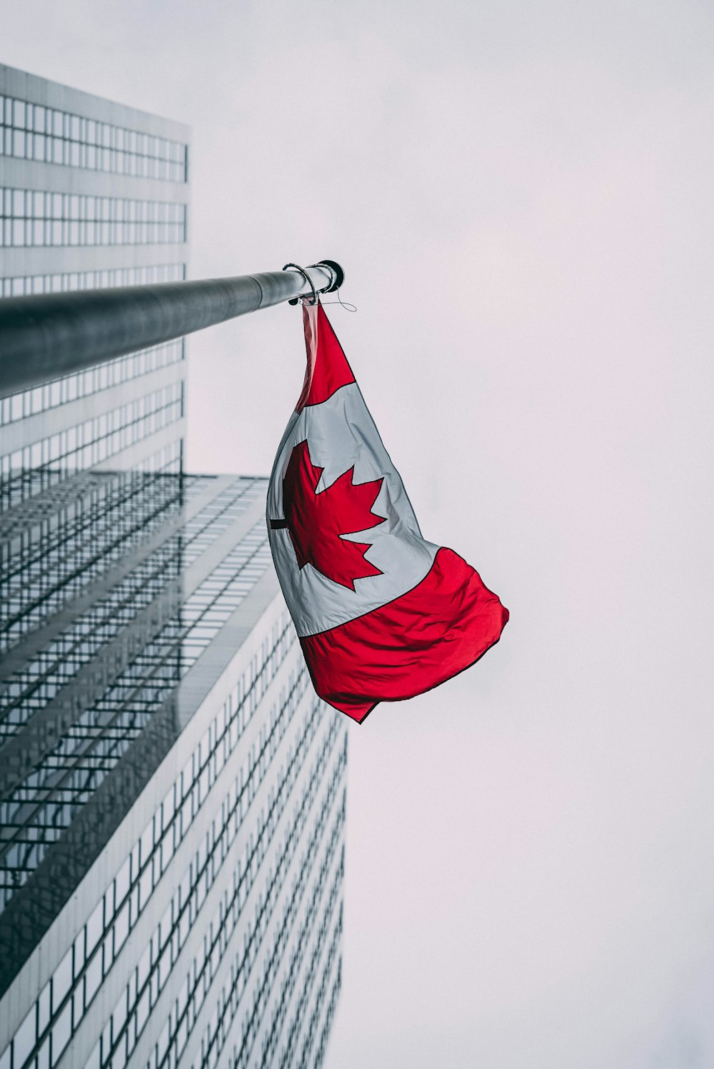 low-angle photo of Canada flag