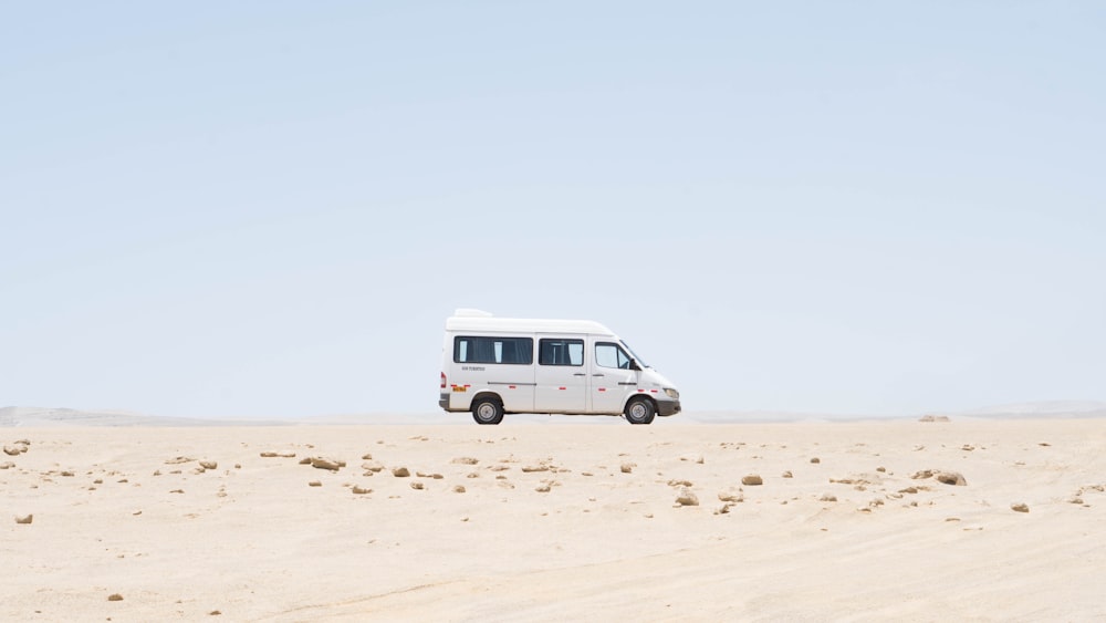 white van on field