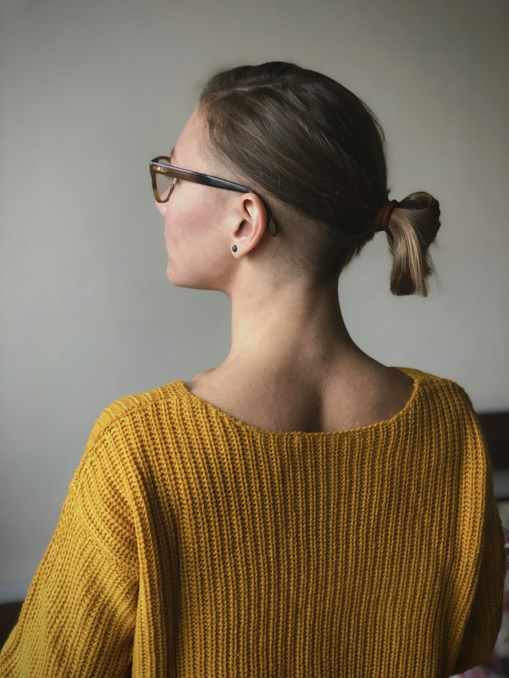 woman in yellow shirt