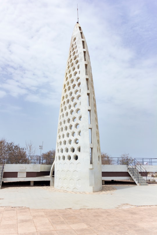 white tower during daytime in Mémorial Gorée-Almadies Senegal