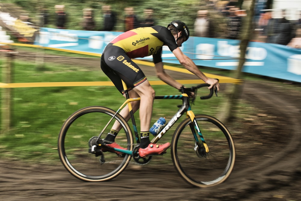 man riding on mountain bike