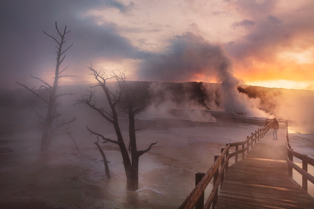 person near geyser