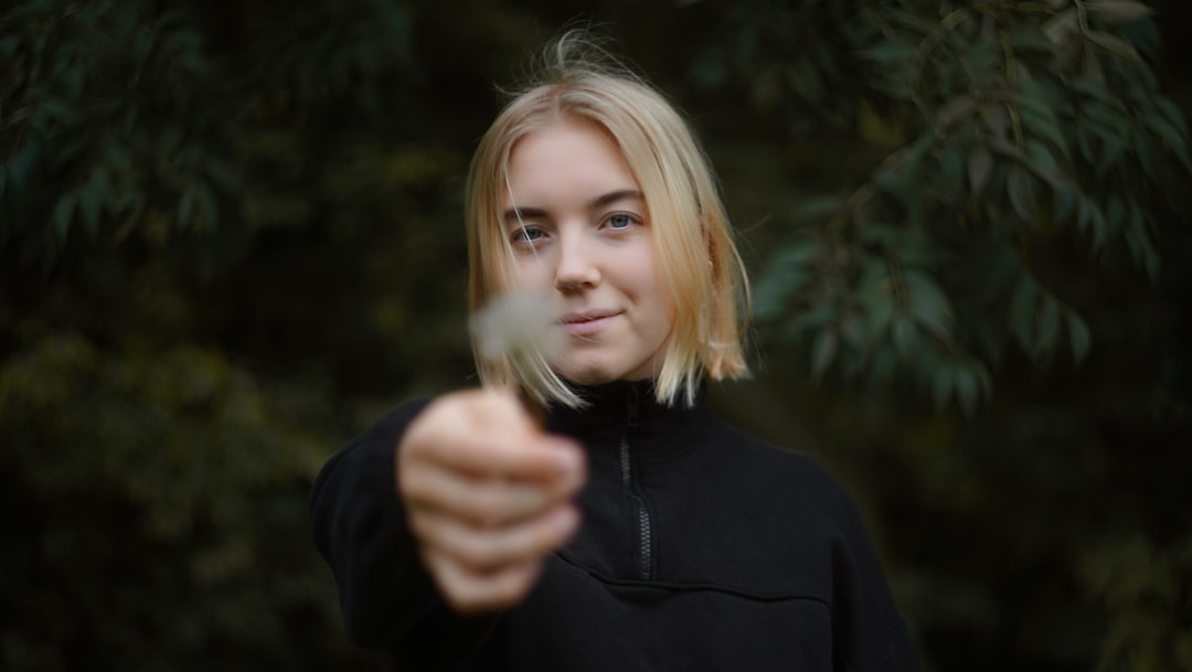 woman wearing black zip-up jacket