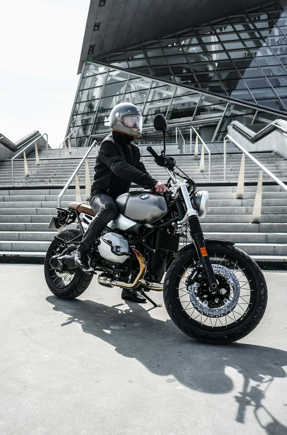 man riding on standard motorcycle