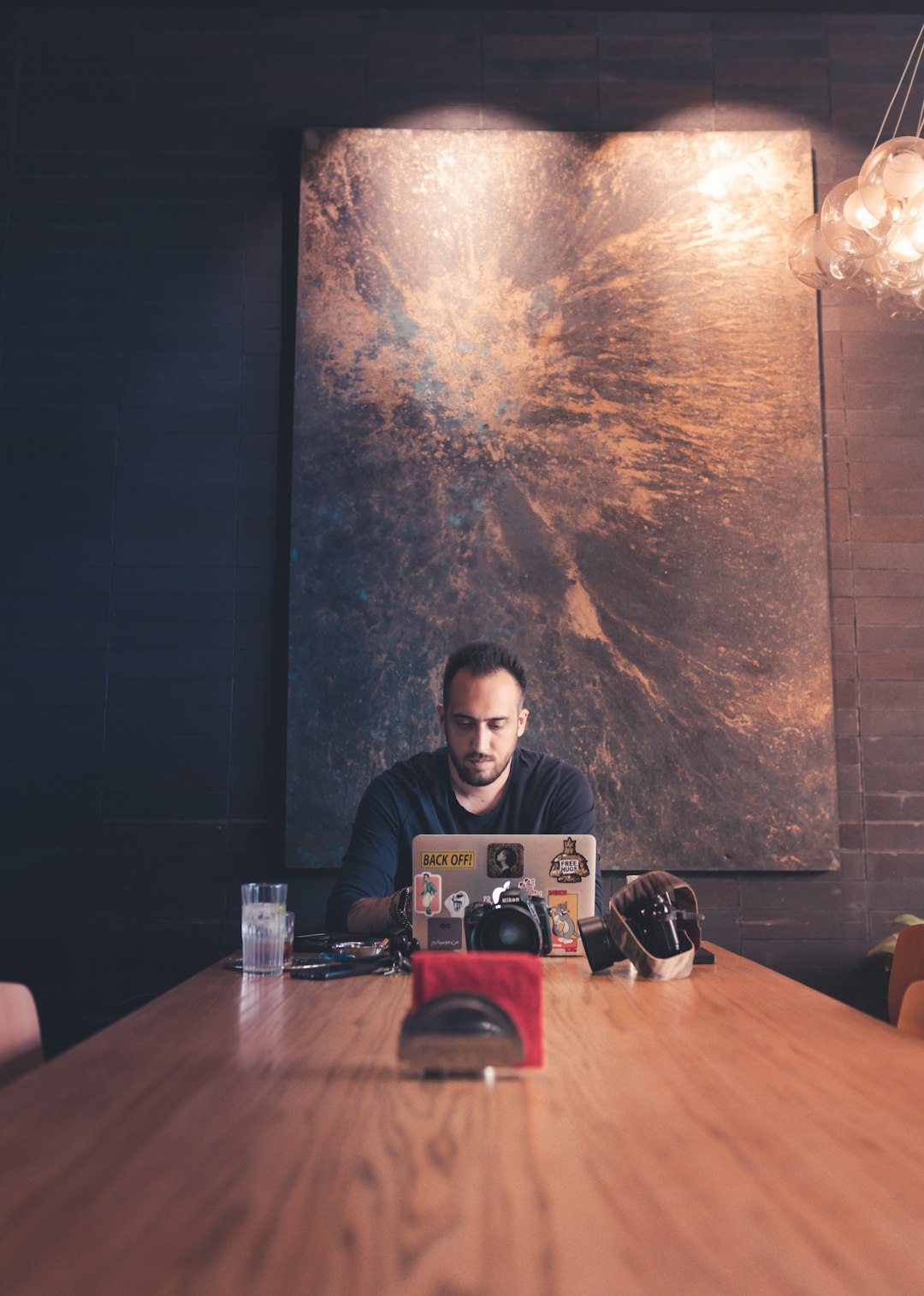 shallow focus photo of man in black crew-neck T-shirt