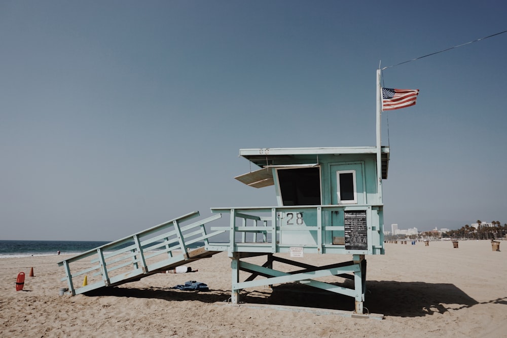 white wooden house near seashore