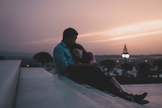 couple on stairs during golden hour in Santiago De Los Caballeros Dominican Republic