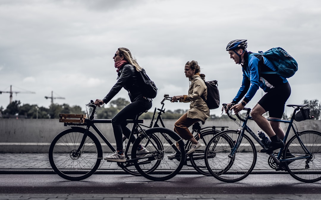 people riding bike, People cycling in Amsterdam (behind Amsterdam Centraal)