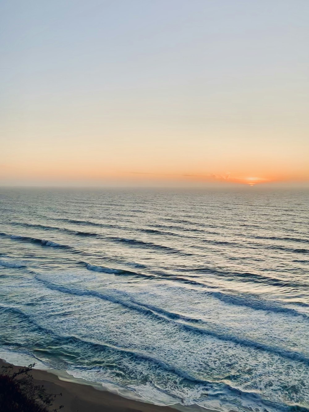 body of water during golden hour