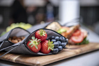 assorted fruits on chopping board