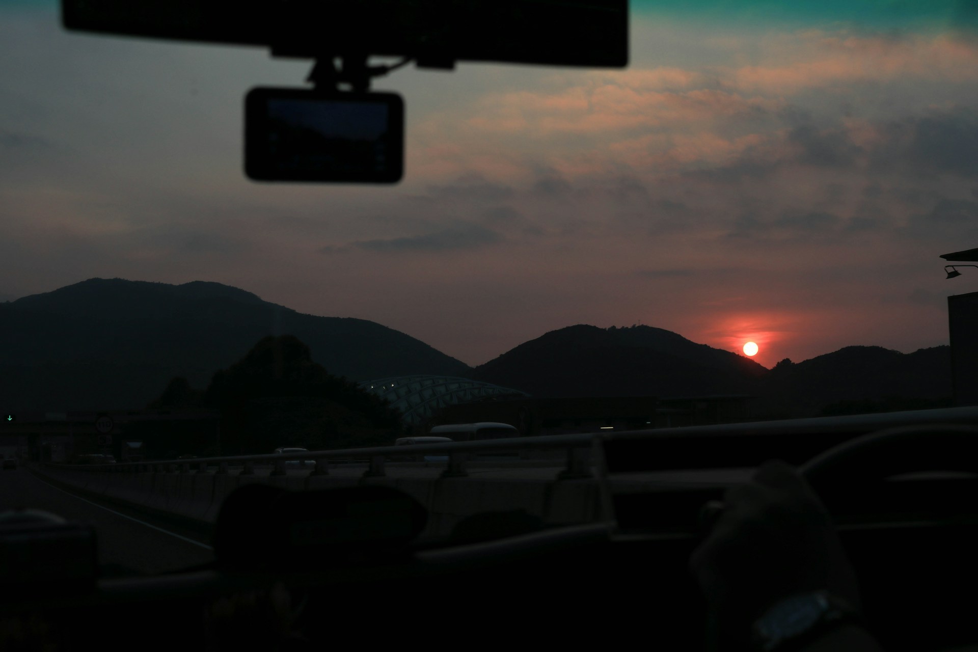 person wearing grey knit sweater