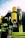 A group of firefighters wearing helmets and protective gear, including bright yellow oxygen tanks strapped to their backs. The reflective stripes on their suits are visible, and they seem to be preparing for or engaged in an operation outdoors under a clear sky.