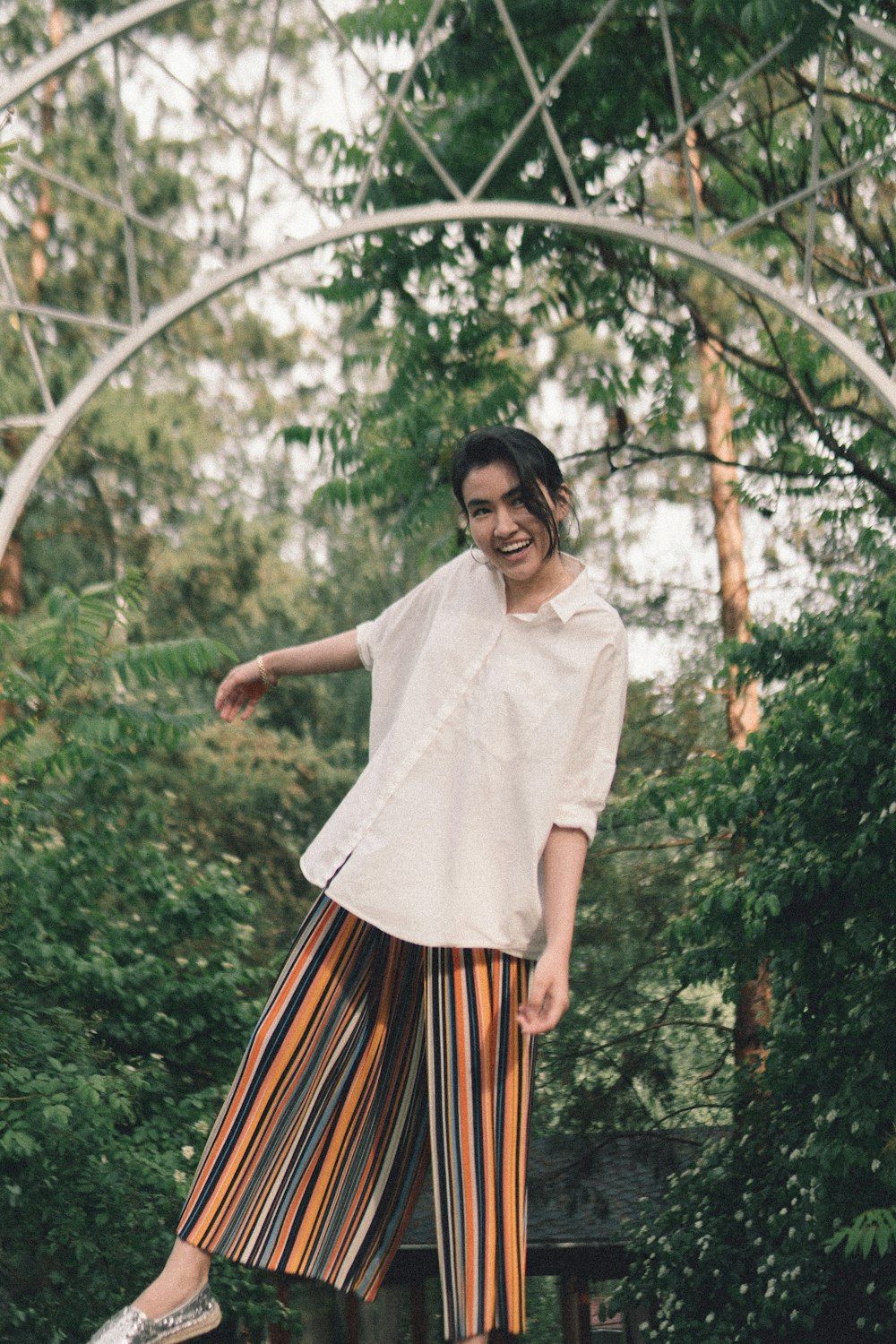 woman near trees during daytime