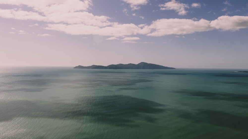 blue sea under blue sky