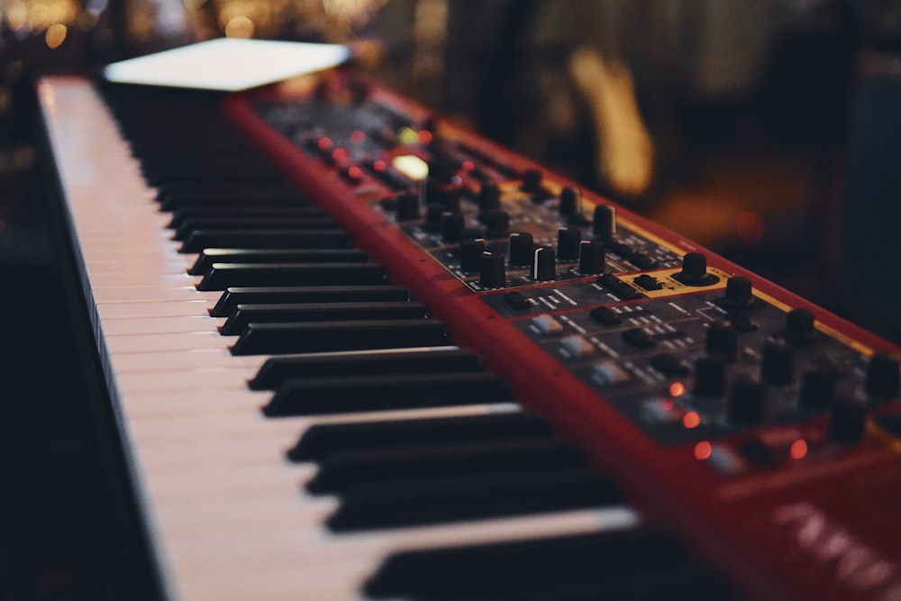 red and white electronic keyboard