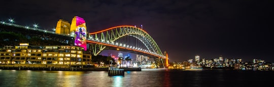red and black bridge at nighttime in Sydney Nowa Południowa Walia Australia