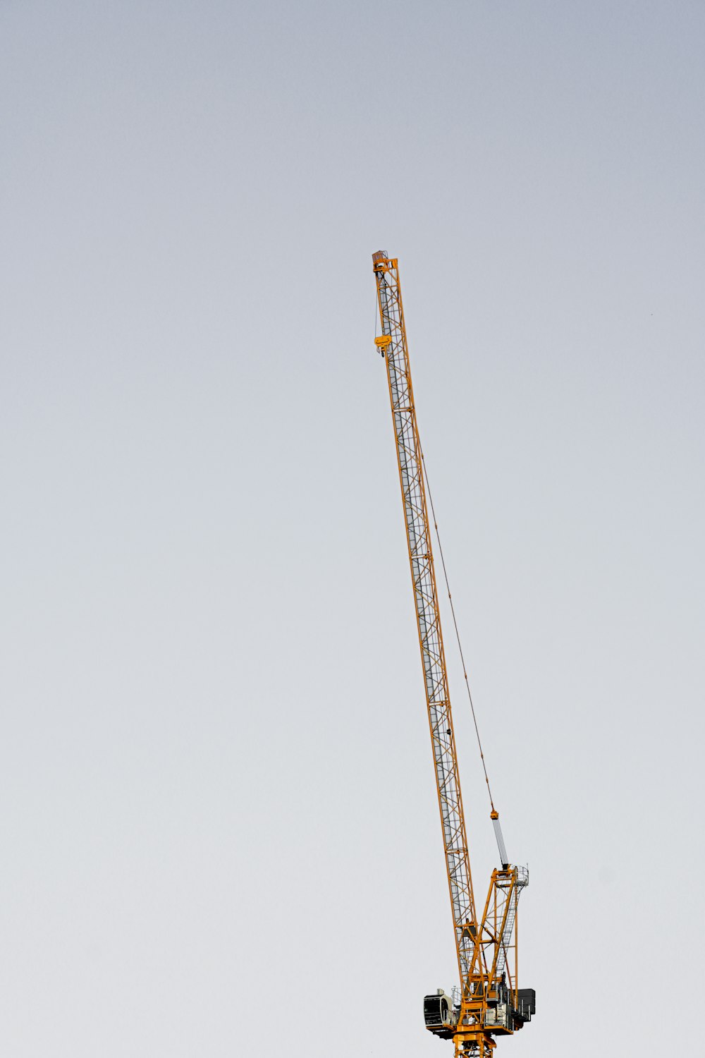 yellow tower crane