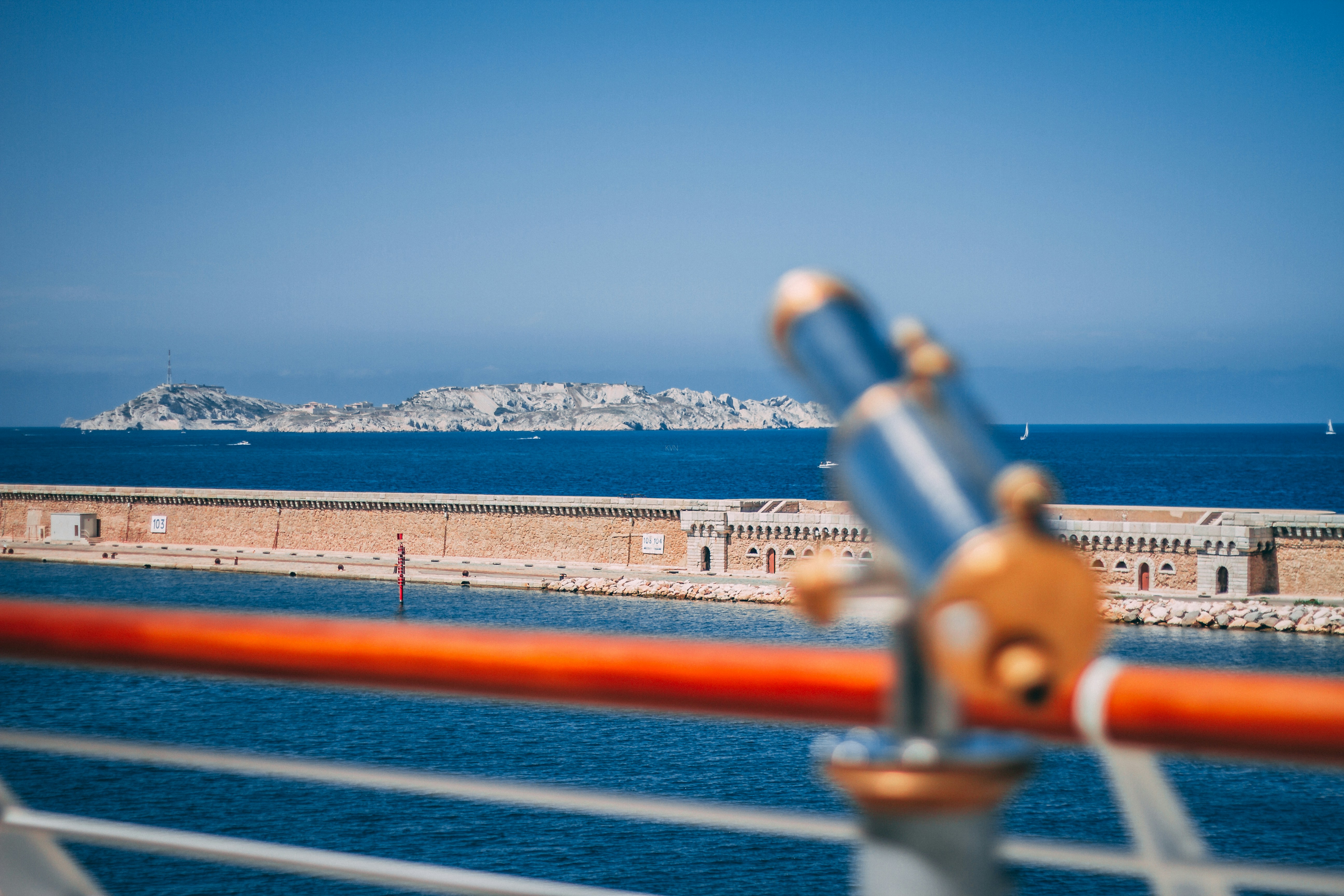 silver spyglass on rail