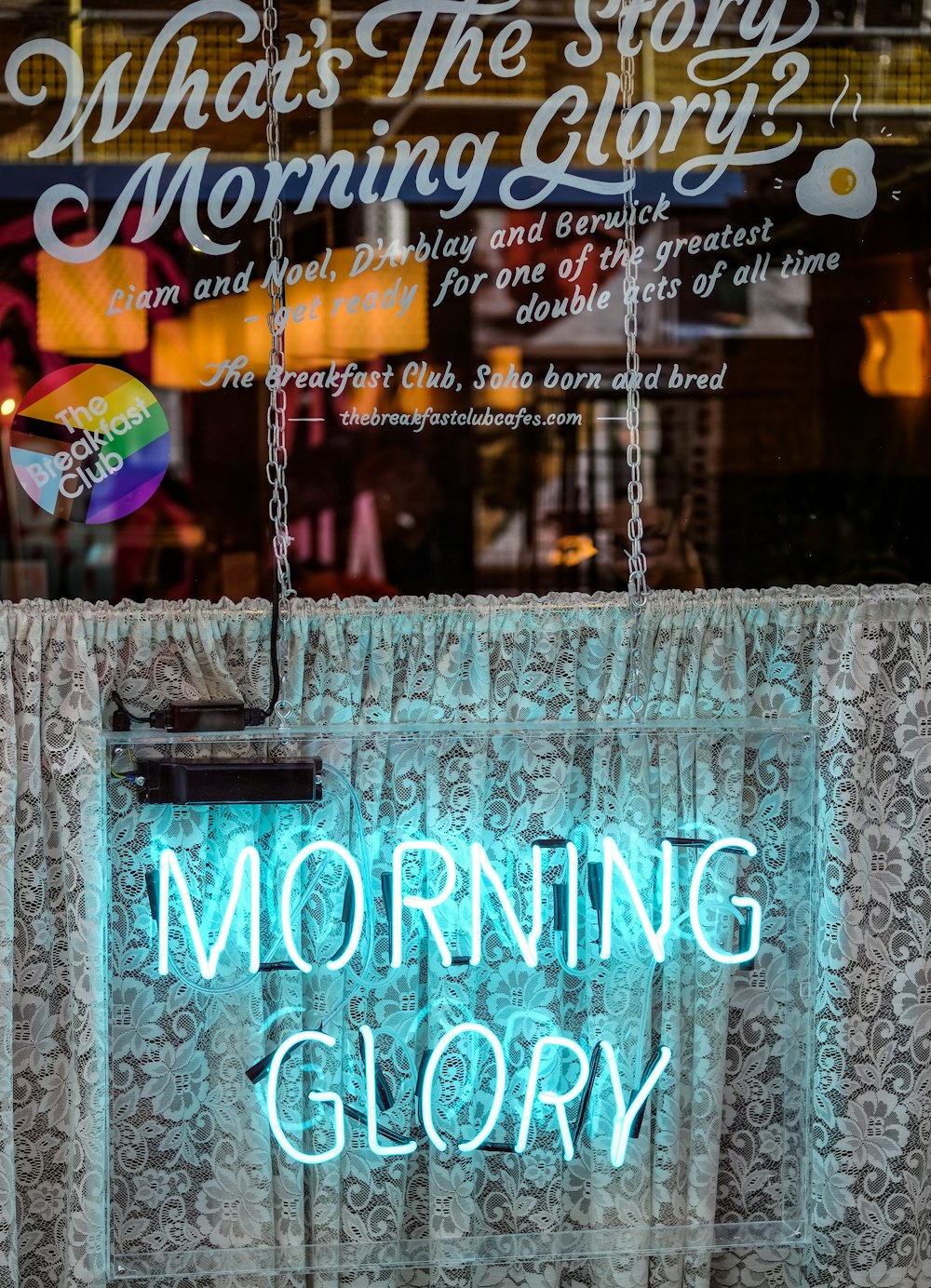 powered-on teal morning glory signage
