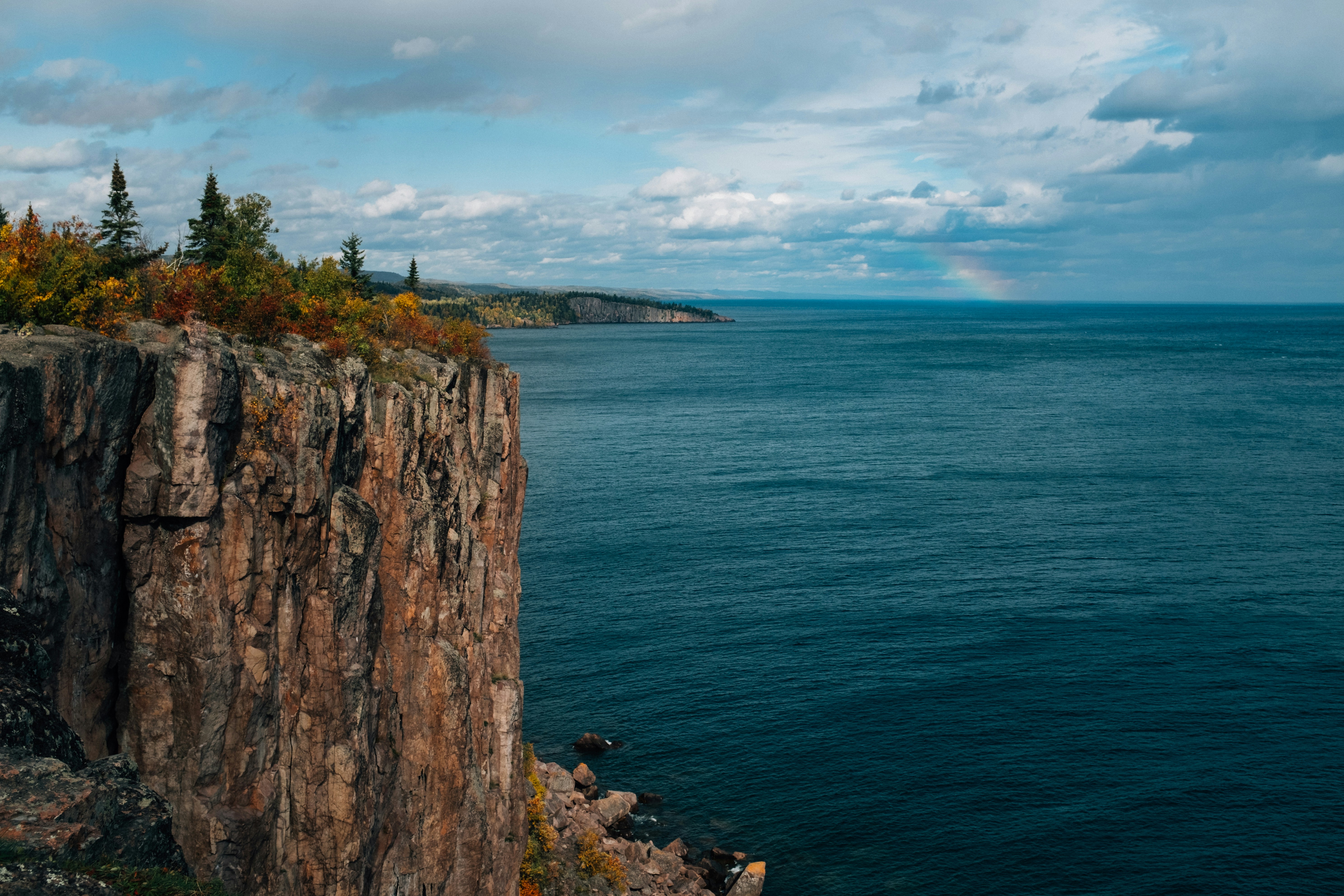 Rainbow over Lake Superior during fall. 