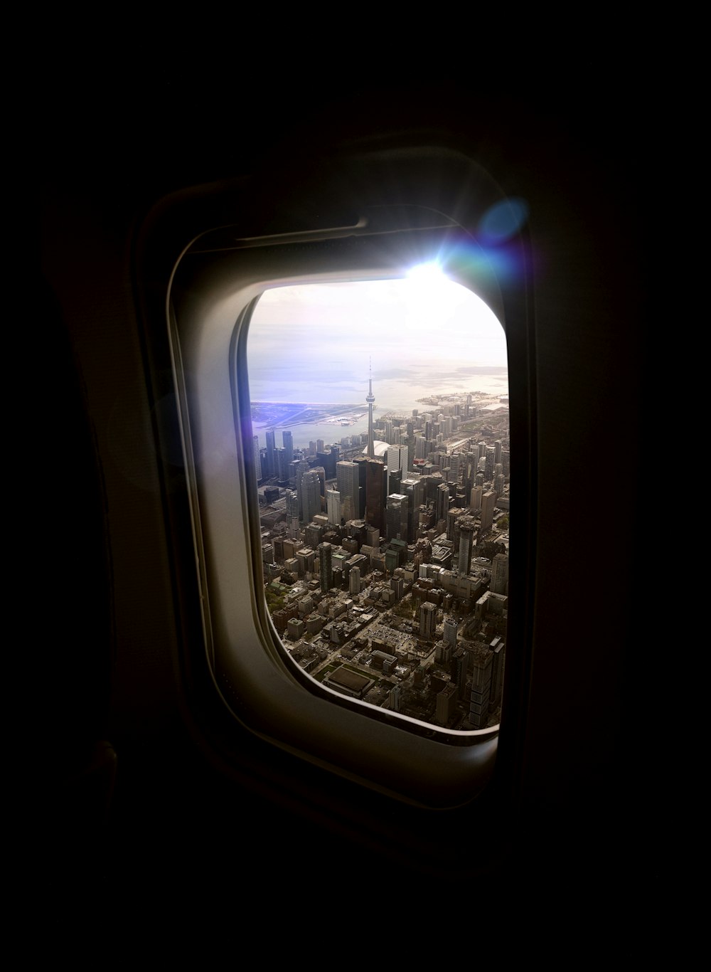 a view of a city from an airplane window