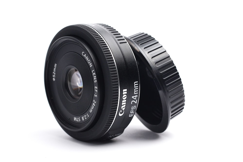 black Canon EFS 24 mm camera lens