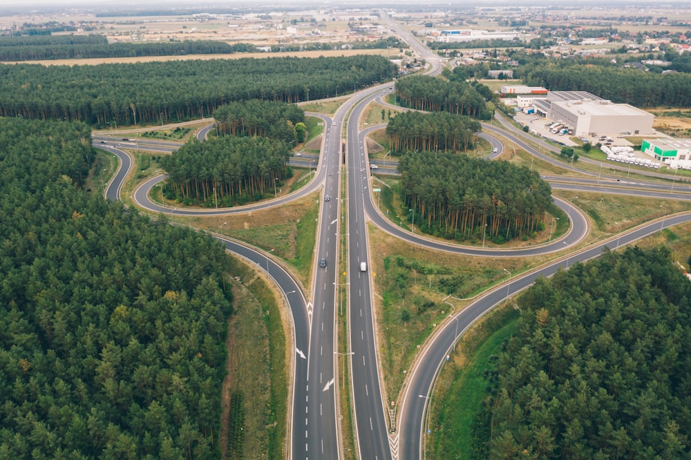 aerial view of asphalt roads and trees