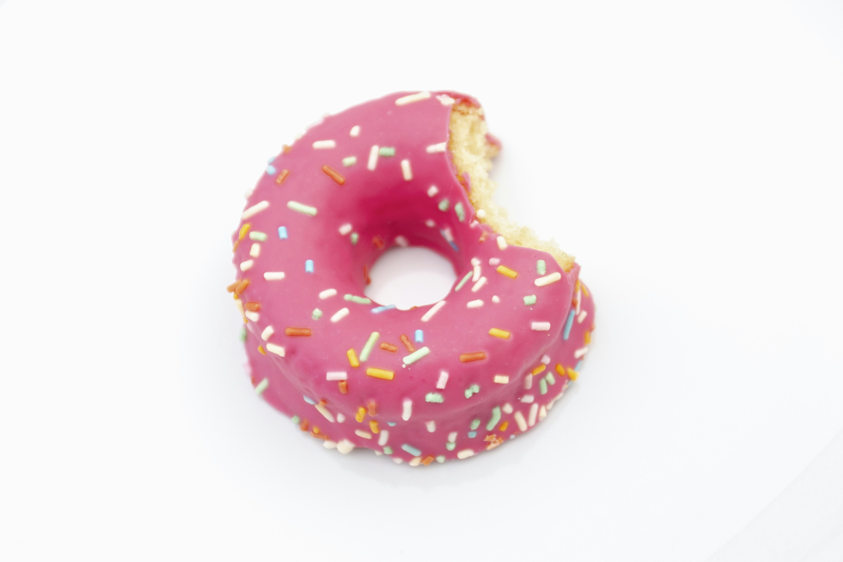 Pink sprinkled donut
