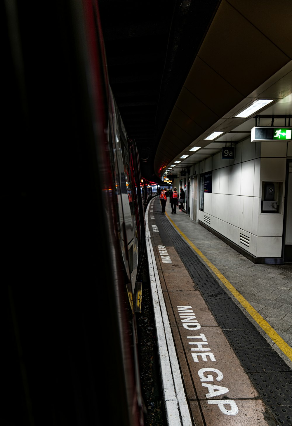 people walking near train